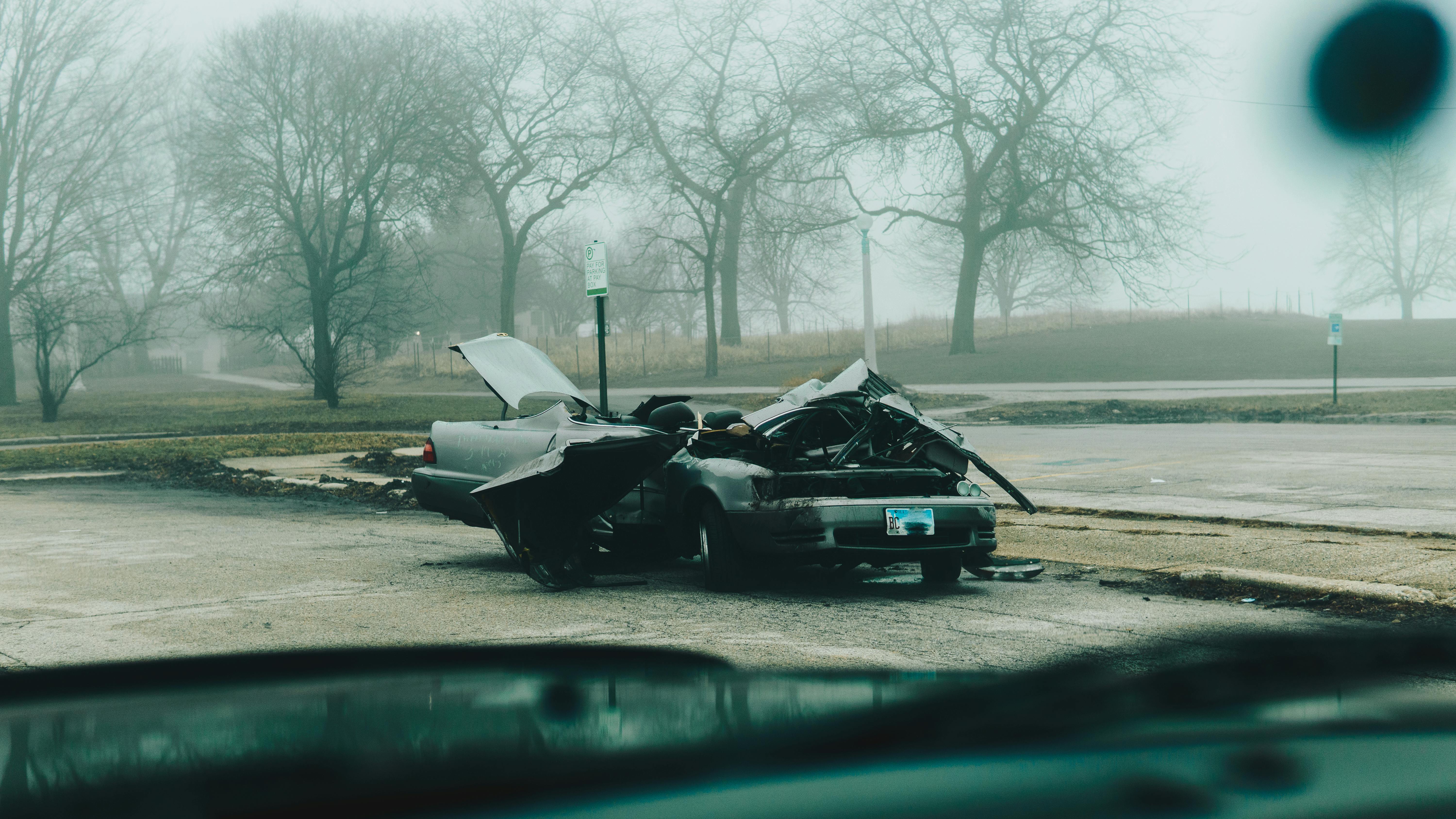 Aftermath of a car accident on a wet road